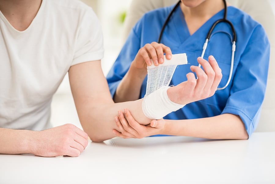 Orthopedic Nurse Practitioner caring for a patient with an arm injury