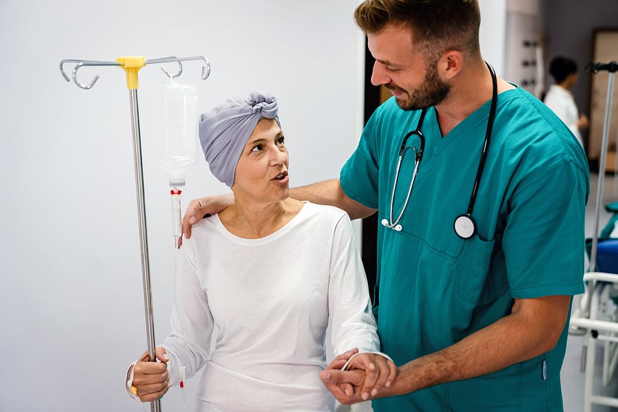 Oncology Nurse Practitioner helping patient on chemo
