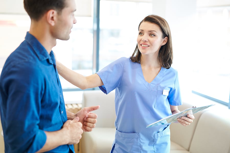 Family Nurse Practitioner greeting patient