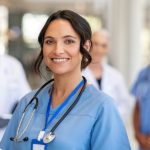 Nurse Practitioner smiling in hospital setting