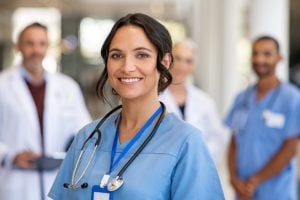 Nurse Practitioner smiling in hospital setting