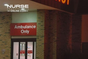 An emergency room with a sign above the door reading Ambulances Only