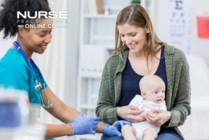 A pediatric nurse practitioner examines a baby while her mom holds her in an exam room.