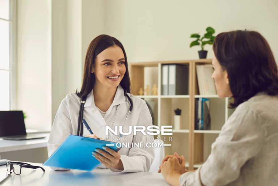 A nurse practitioner meets with a patient in her office.